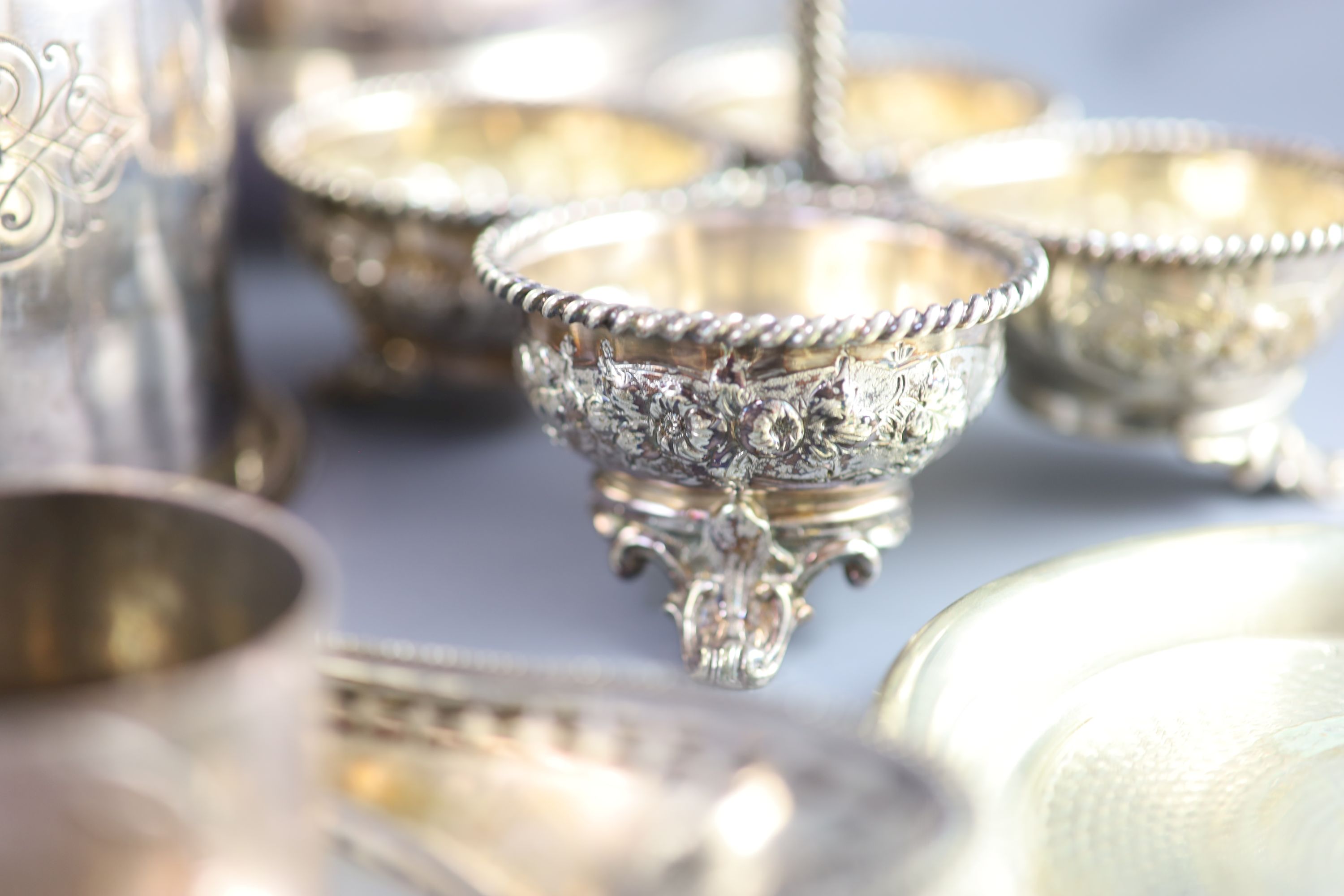A silver plated egg cruet, a butter dish, a table salt and sundry other plated wares